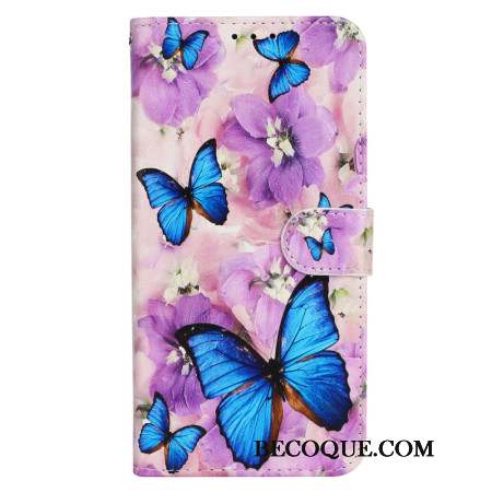 Housse iPhone 16 Papillons Bleus et Fleurs Violettes à Lanière